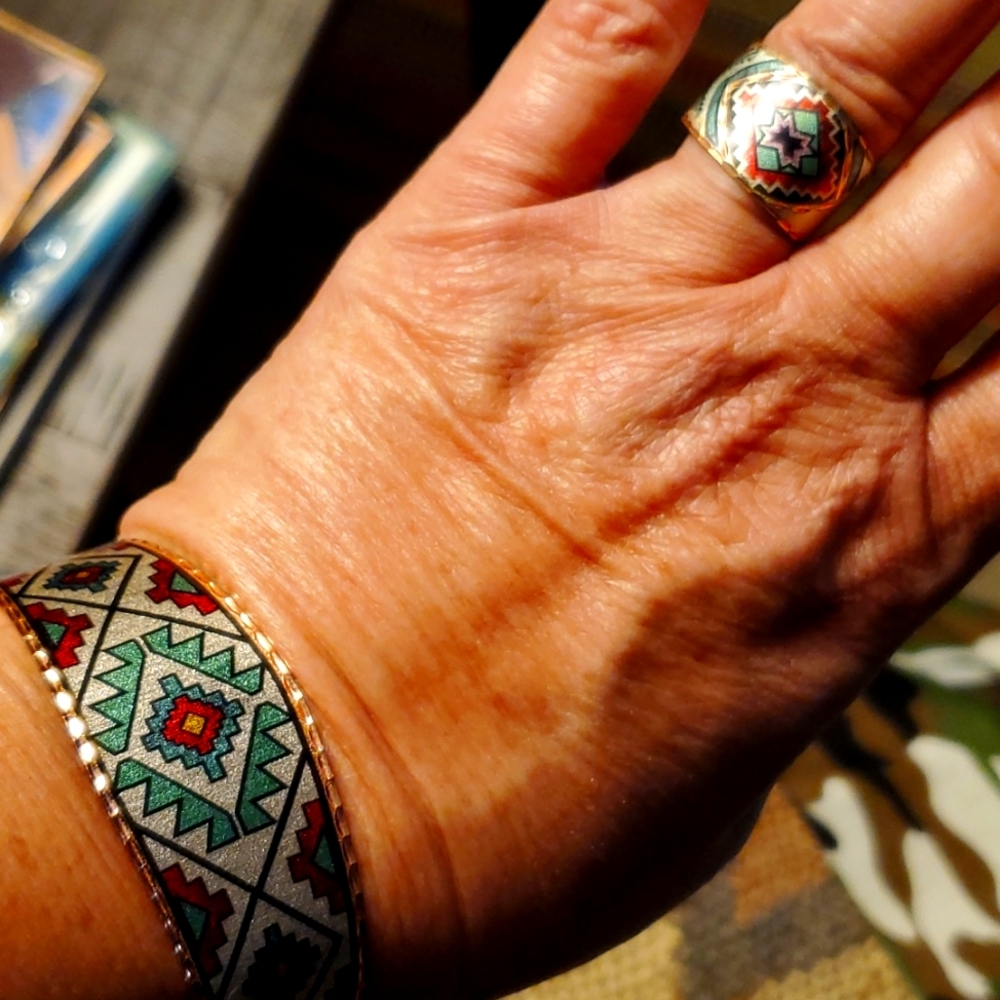 Copper colored southwestern style cuff bracelet and ring.